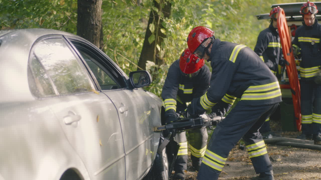 Firefighters Rescue Operation at a Car Accident