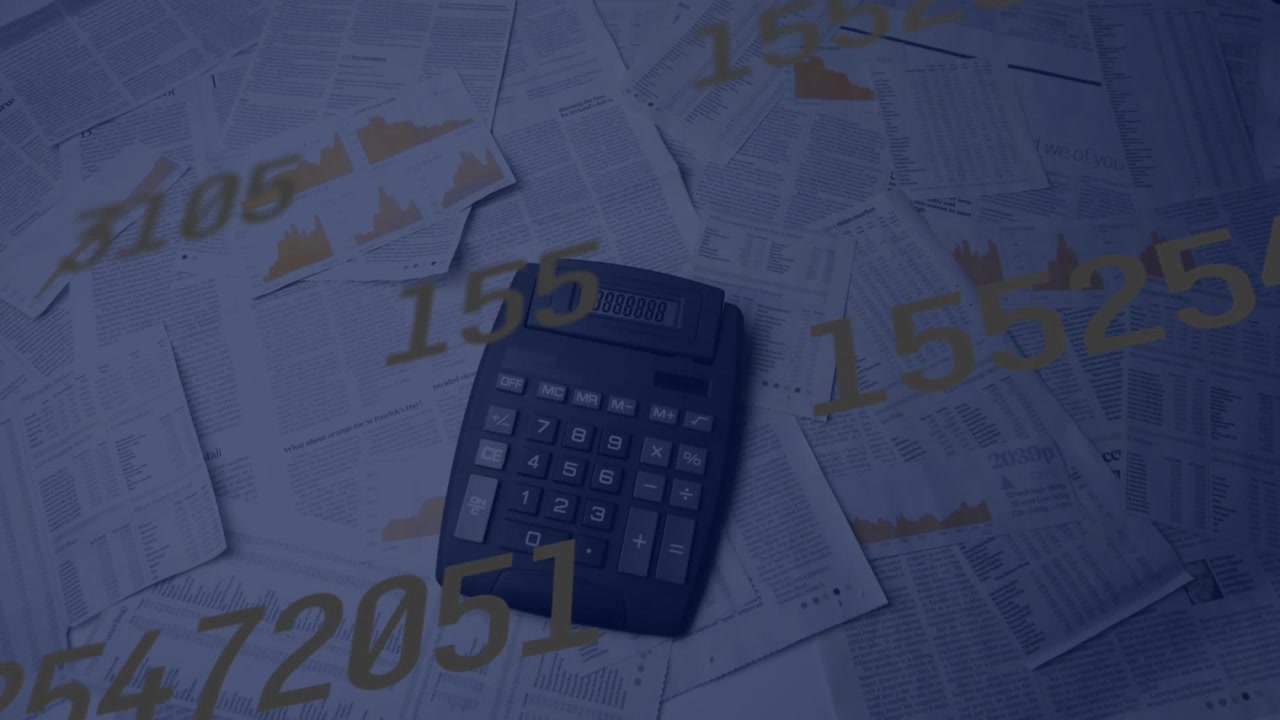 Animazione di numeri che fluttuano sopra una calcolatrice vintage
