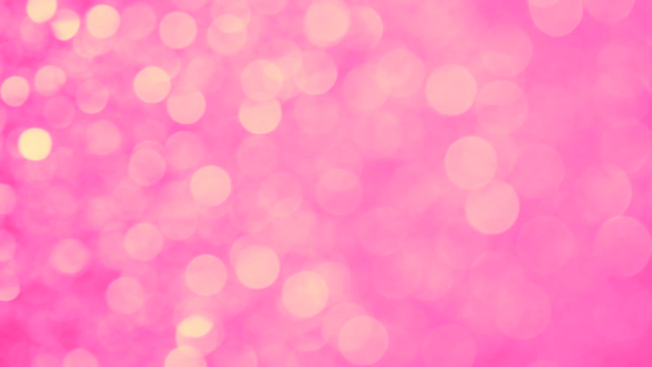 pink abstract blurred Christmas lights bokeh background