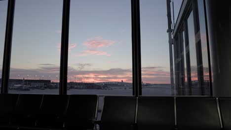 pink and blue sky in a sunrise at the ohare airport in chicago, nobody, still shot