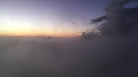 panning timelapse of rolling cloud in mountains
