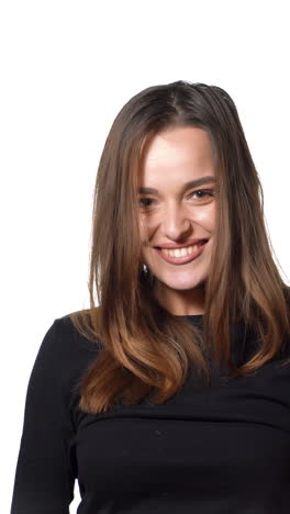 brunette with shopping bags on white background. successful caucasian fashion brunette after buying clothes. shopaholic concept. vertical video