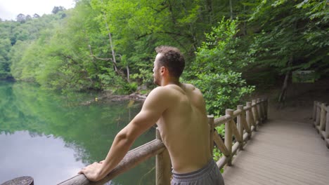 man jogging in the forest.