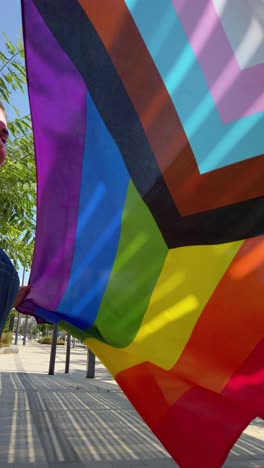 progress pride flag waving in the wind