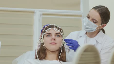 patient brain testing using encephalography at medical center