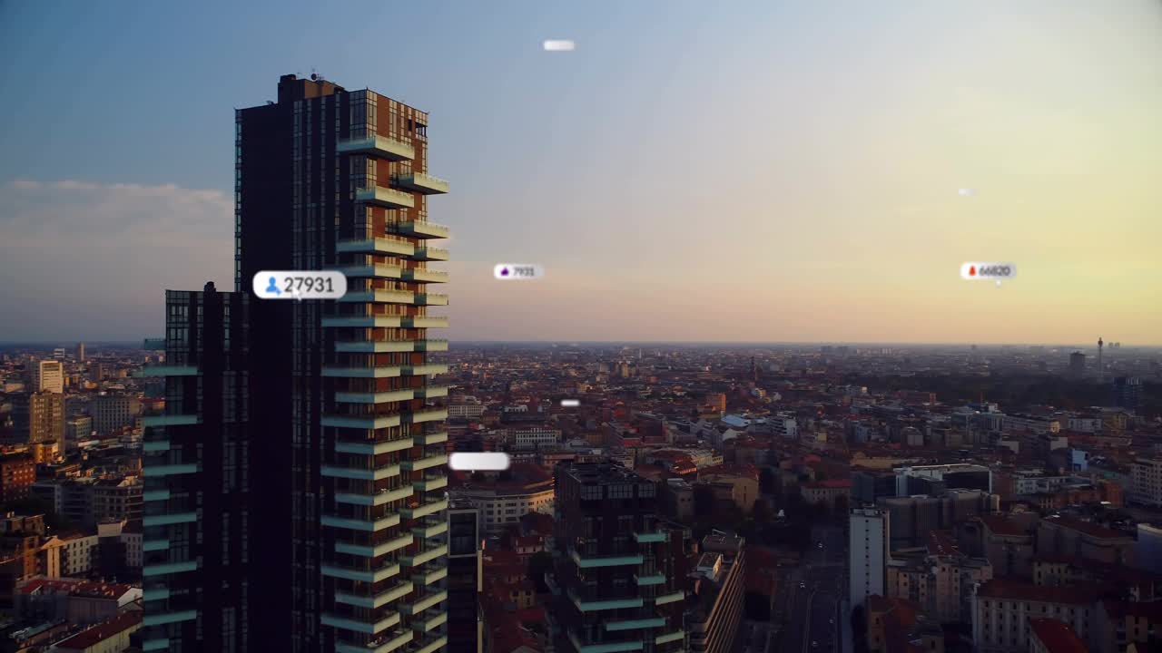 Badges aparecendo, agrupando-se na torre e, em seguida, movendo-se para a direita enquanto a câmera faz uma panorâmica mostrando a atividade