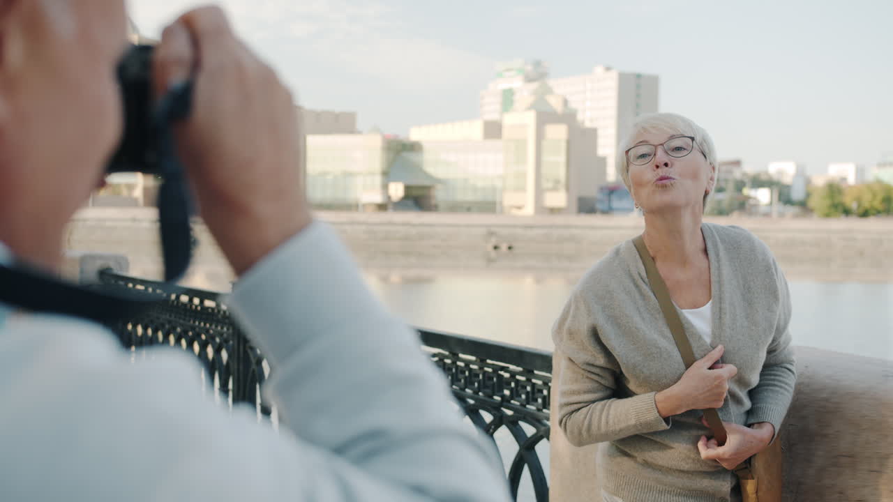 Senior Couple Taking Pictures Outdoors
