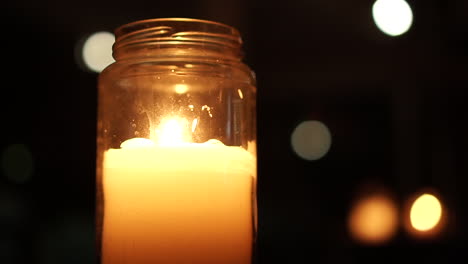 candle into glass