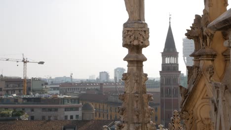 Decorations-of-Milan-Duomo-and-cityscape-in-background,-static-view