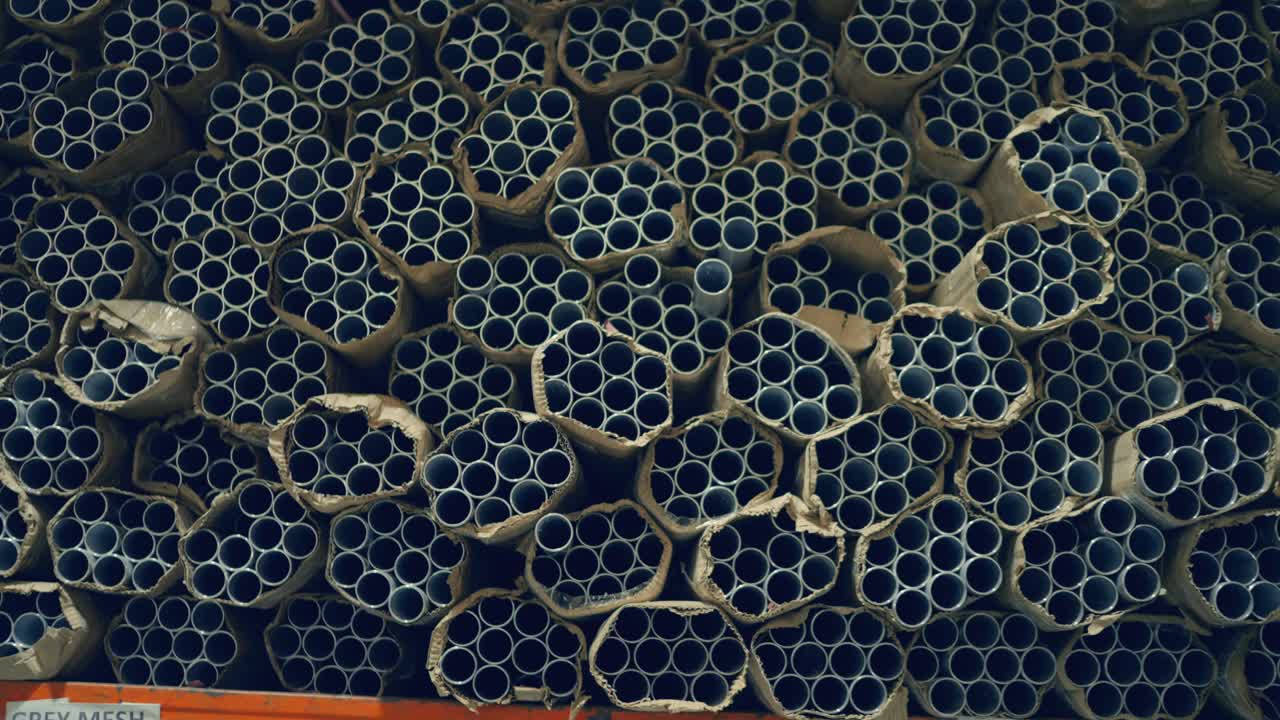 Raw material for tent poles: Bundles of aluminum pipes in a Sialkot factory