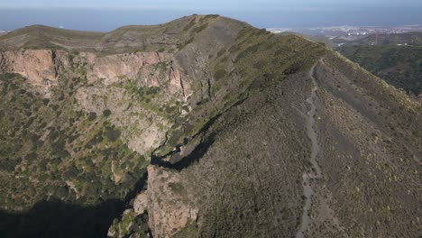 Aerial-drone-shot-of-gigantic-Caldera-de-Bandama-Nationalpark-with-Volcanoes-on-Gran-Canaria-Island