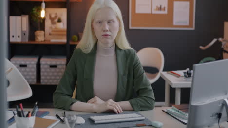 woman sitting at her desk in an office