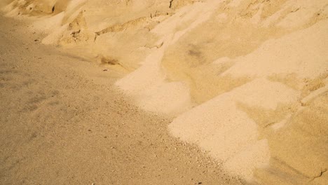 4k coastal sand erosion on beach