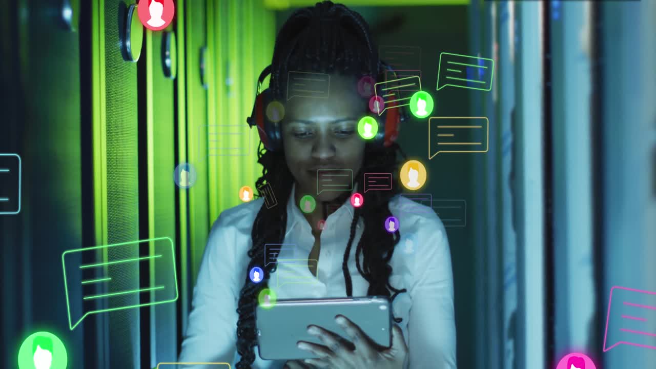 Animation of social media icons over african american woman working in server room