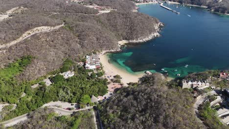 aerial view of bahia la entrega, with bahia santa cruz in background, huatulco, oaxaca