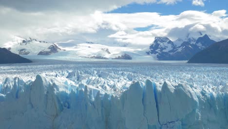 zooming out to revel a massive glacier and it’s crevasses