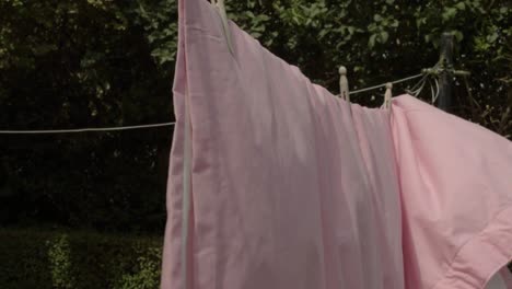 washing hanging on the line with wooden pegs