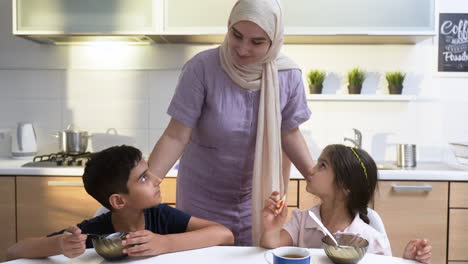 islamic children having breakfast.