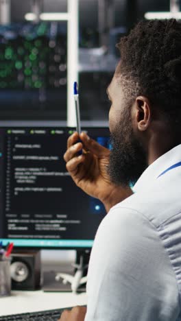 vertical video server farm computer scientist interprets ai generated data analytics graphs