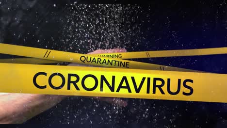palabras de coronavirus, cuarentena y advertencia escritas en cinta amarilla sobre la persona que se lava las manos