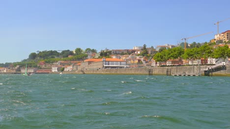 stunning view from boat cruising on douro river in porto, portugal