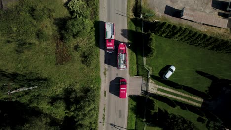 Bird-Eye-View-of-Fire-Trucks-Passing-Each-Other-on-the-Narrow-Road-4k