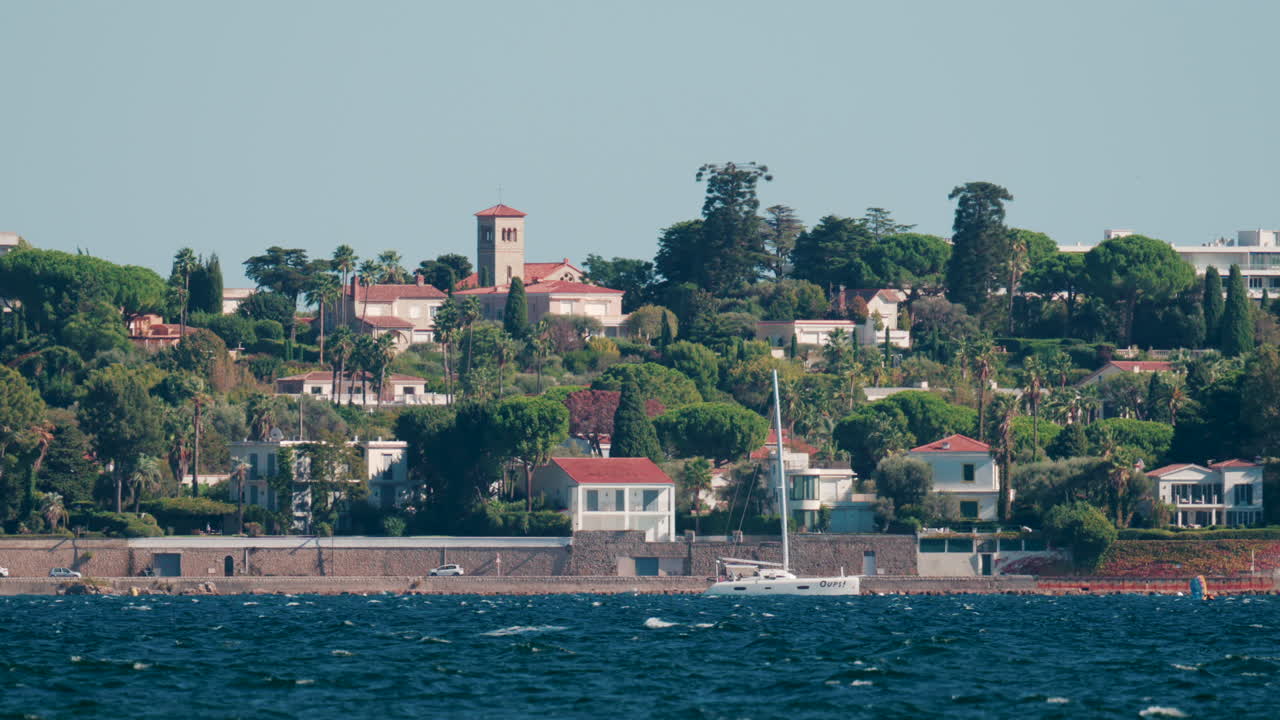 Cannes, France - October 6, 2025: Scenic view of luxury villas and Mediterranean gardens on the hills near the sea