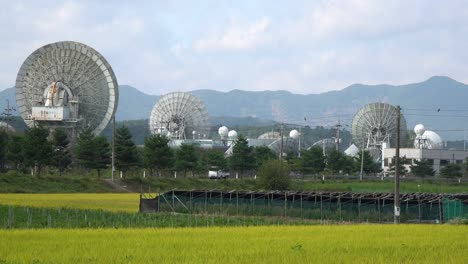 group of massive huge satellite dishes in kt sat satellite center in geumsan city, south korea