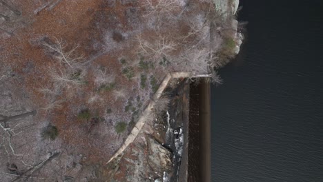 A-top-down-shot-over-a-reservoir-in-the-winter-at-sunset