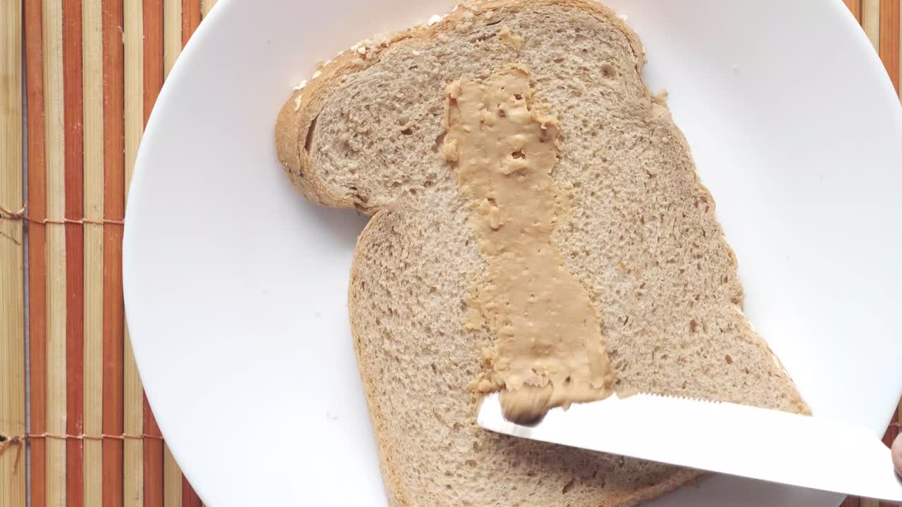 Making a Peanut Butter Sandwich on Whole Wheat Bread