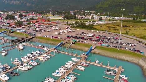 4k drone video of boats and ships in valdez harbor in valdez, alaska during sunny summer day