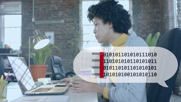 Animation of binary coding over biracial businesswoman having lunch in office