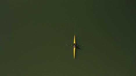 aerial view of crew member rowing her boat