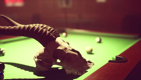 a skull on a pool table