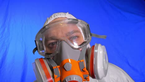 scientist virologist in respirator. man close up look, wearing protective medical mask. concept health safety n1h1 coronavirus epidemic 2019 ncov.