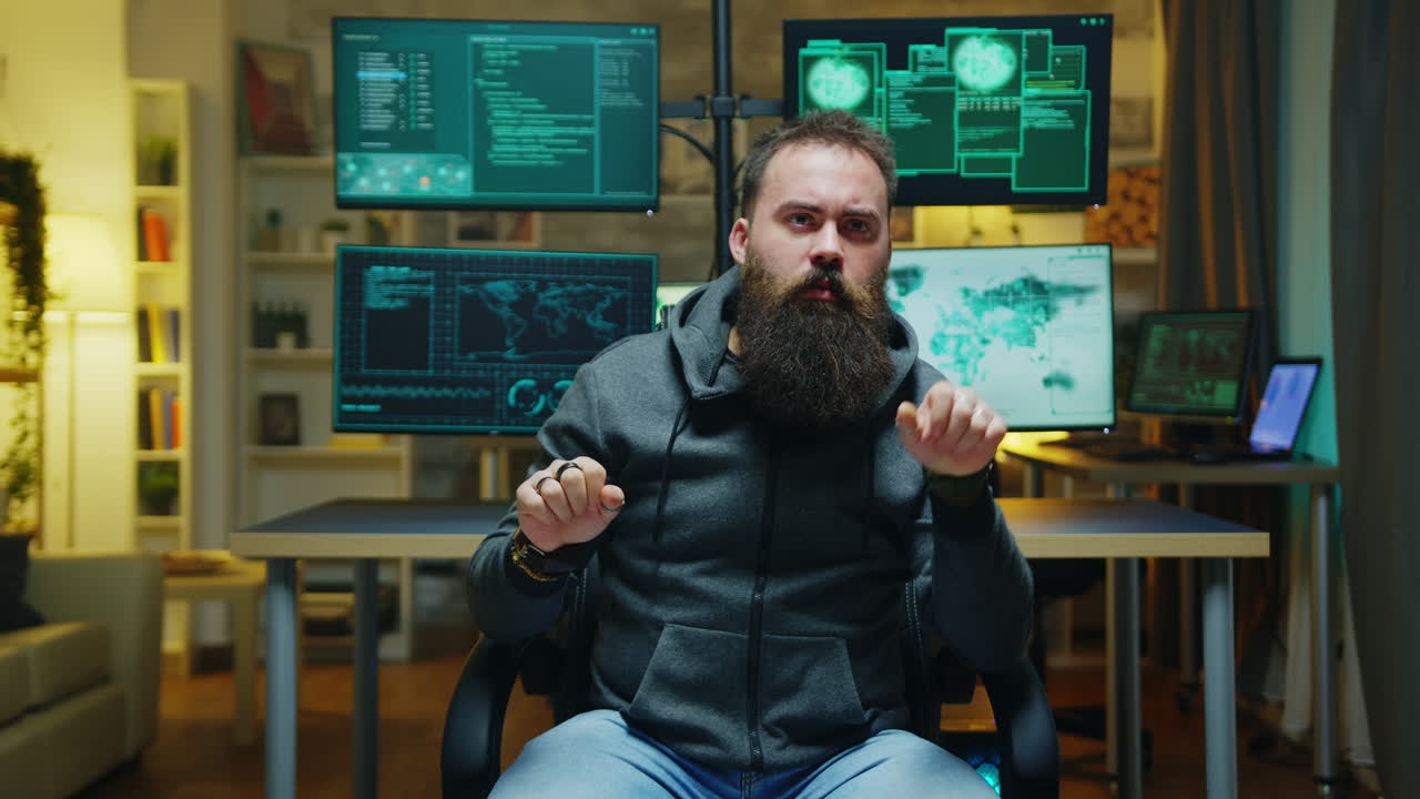 Bearded hacker doing hand gestures using augmented reality