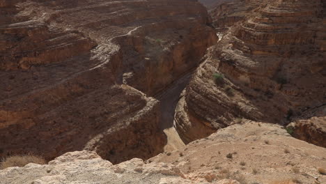 aerial shot of the mides canyon in tunisia showcasing arid landscape and erosion patterns