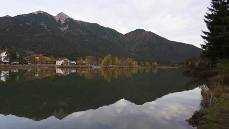 autumn reflections in wildsee a lake in the mountains of the alps in seefeld in tirol in austria