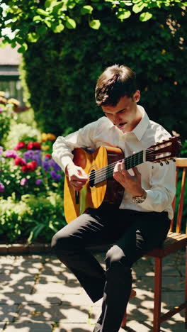 man playing guitar in a garden
