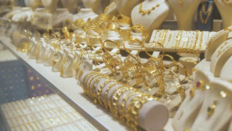 beautiful gold bracelets in turkish jewelers shop window