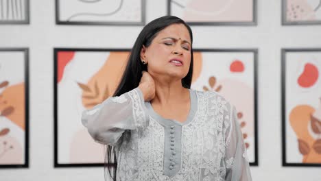 Indian-mother-having-neck-pain