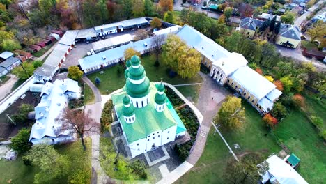 4k .aerial.  christian ortodox church  dome or monastery in city. circular flight