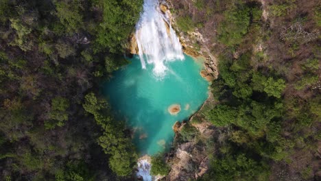 aerial: tropical waterfall in mexico, beautiful natural formation in jungle, 4k