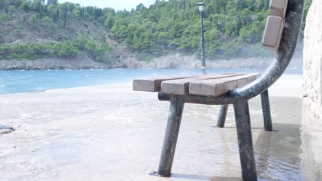 Wooden Bench on a Waterlogged Pier