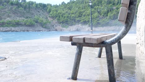 wooden bench on a waterlogged pier