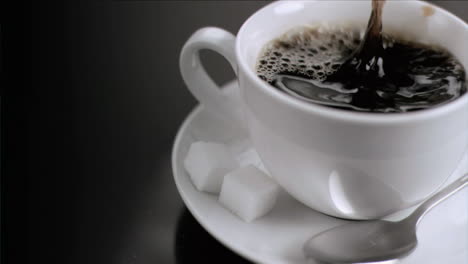 cube of sugar falling in super slow motion