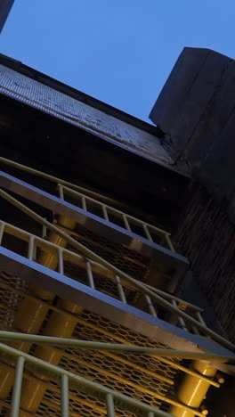exterior building fire escape at night