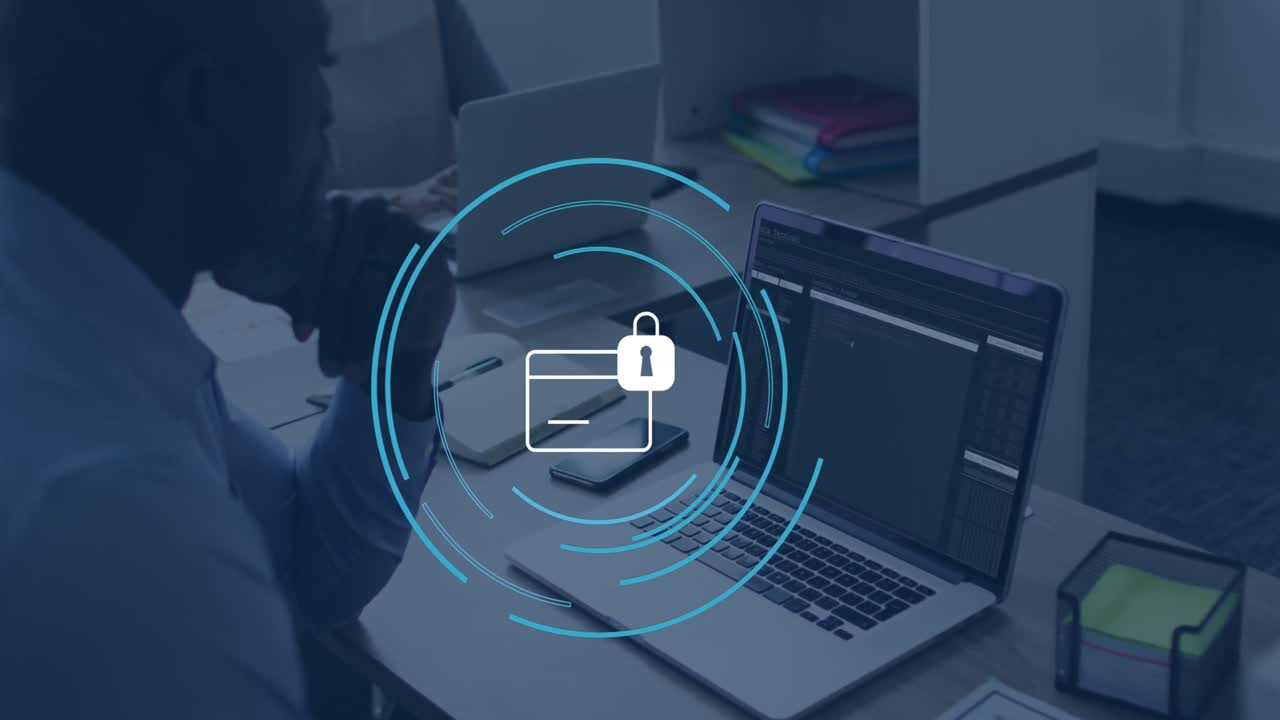 animación del icono de la tarjeta de crédito sobre el empresario afroamericano que usa una computadora portátil en la oficina