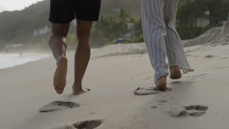 people running at the beach