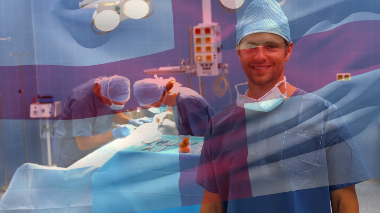 수술실에서 외과 의사 들 위 에 흔들리는 영국 국기 의 애니메이션